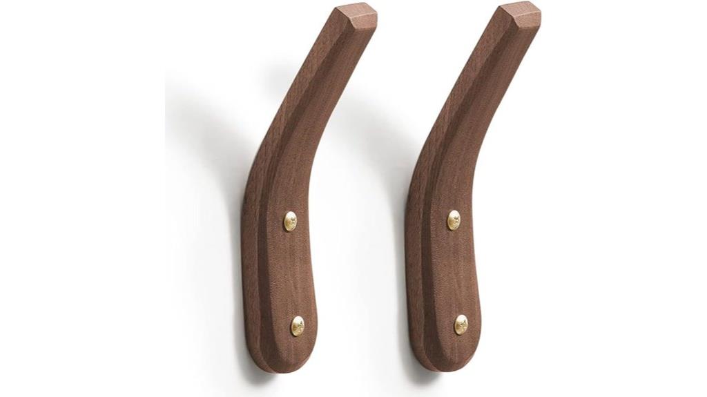 two wooden wall hooks