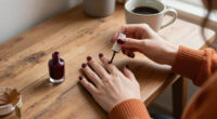 Anne Hathaway's Moody Fall Manicure Is So Stylish—Here's The Exact $13 Shade Behind Her "Cherry Noir" Nails